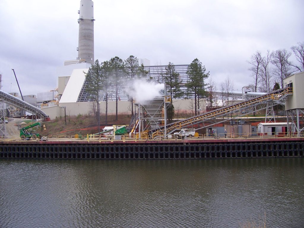 Products for power plants to control and reduce fugitive dust emissions during coal transportation, conveying, and stack out of bulk materials.